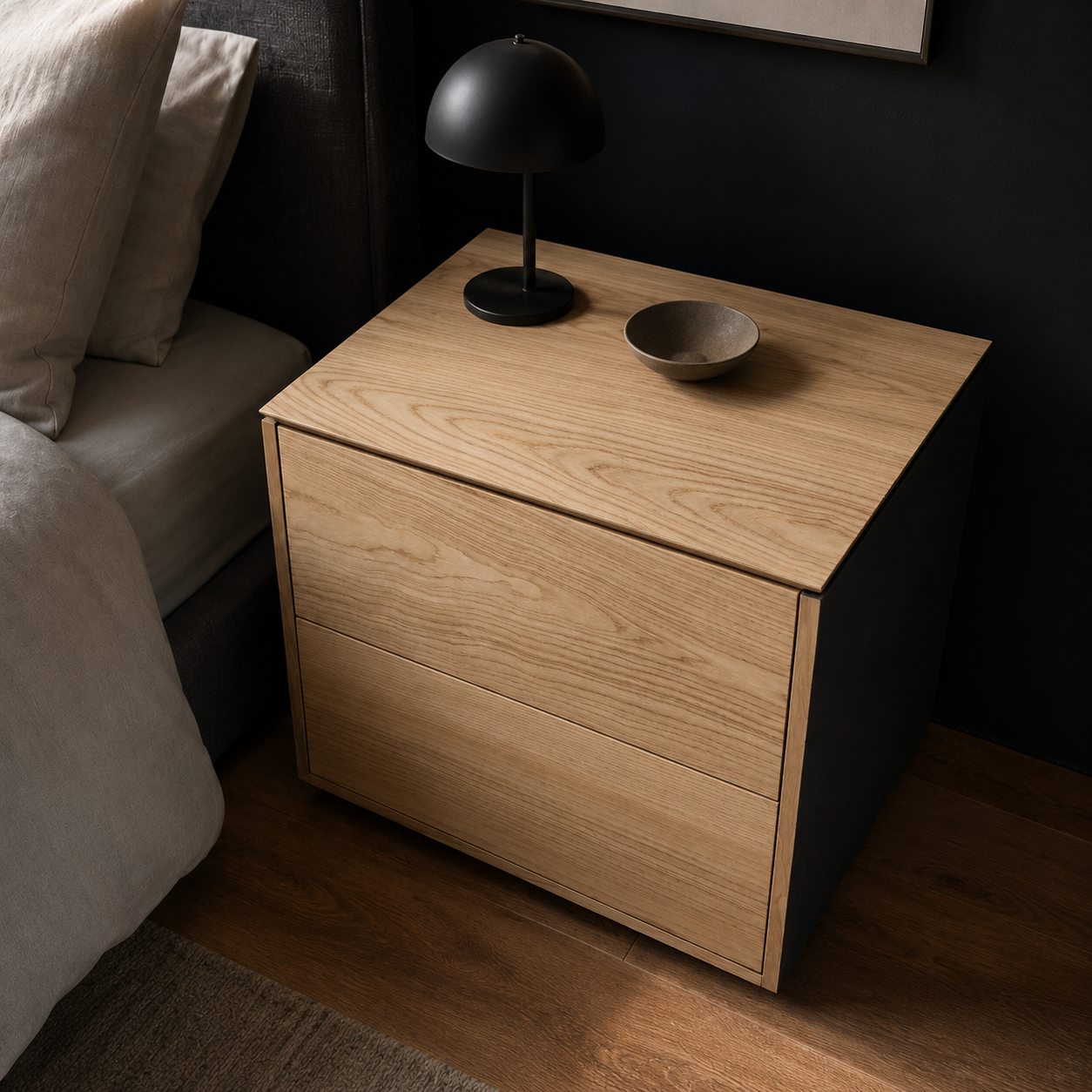 Two-drawer nightstand with solid ash drawer fronts and black painted frame, built in Edmonton.