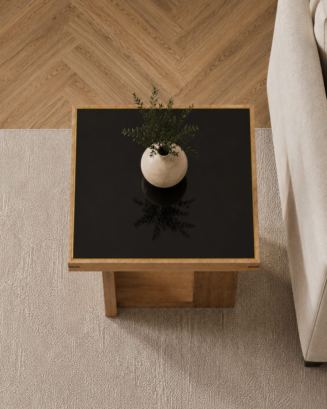 Custom black-top coffee table with wood frame and pedestal base, built by E-Town Woodworks in Edmonton.