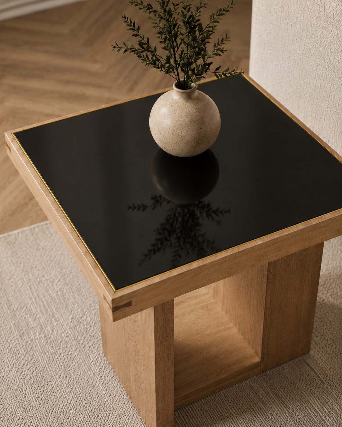 Oak coffee table with a black inset top, wood frame, and clean modern base.