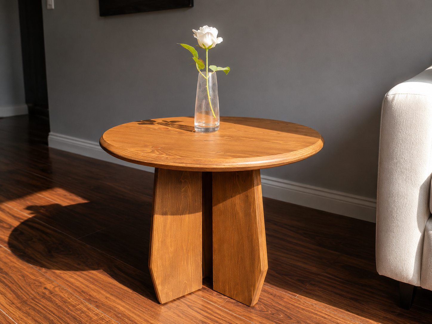 Handmade solid wood round side table with warm walnut finish, built by E-Town Woodworks in Edmonton.